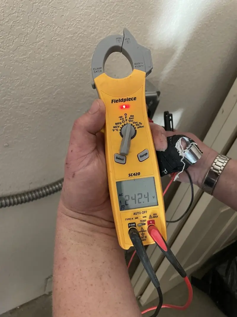 Voltage testing with clamp meter during Electrical Installation Services in North Myrtle Beach